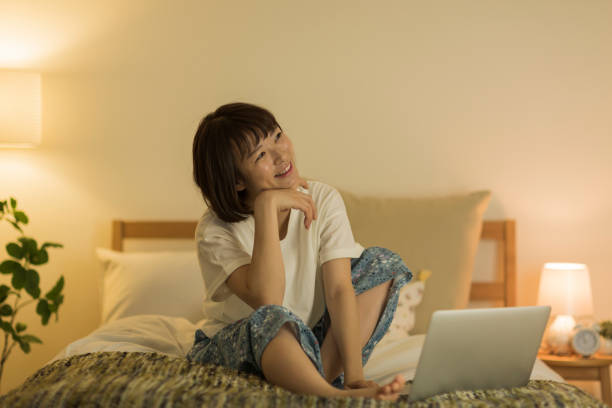 istock Young woman spending time at home 1307852848