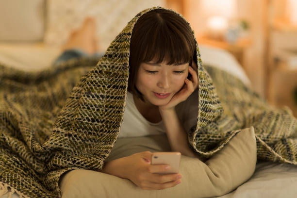 istock Young woman spending time at home 1307852856