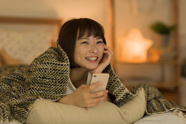 istock Young woman spending time at home 1307852861