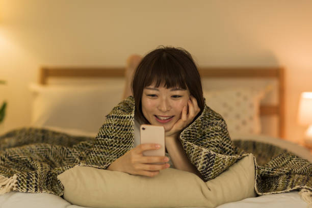istock Young woman spending time at home 1307852866