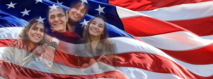 Conceptual image of family and American flag