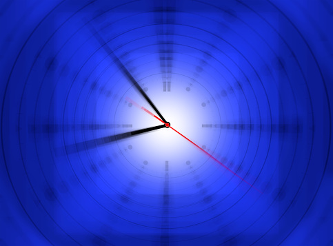 Conceptual time concept of close up glowing clock face over black background