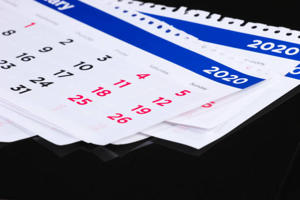 istock Monthly calendar 2020 on a black background. 1307865061