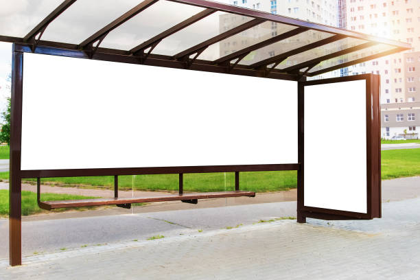 istock Horizontal and vertical advertising banners with mockup place on urban stop bus. 1307868215