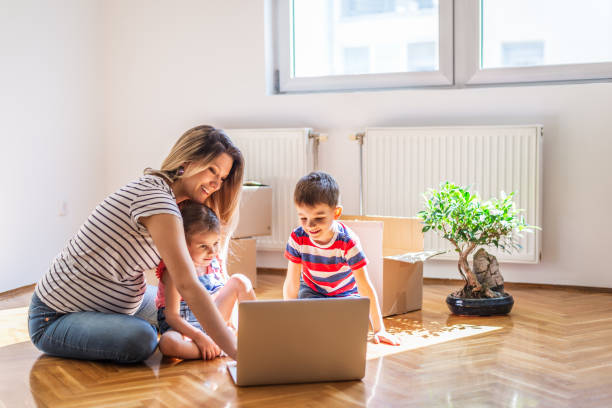 istock Family moving into new home 1307872670