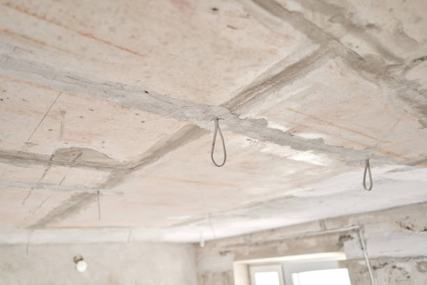 istock Installation hidden wiring for room lighting. External spots. Professional draft electrical wiring in house or apartment during repair. Concept distribution of electricity in apartment, safety 1307873060