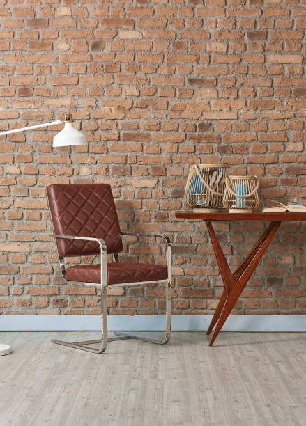 istock modern home interior study room raw brick wall with wooden desk chair 1307874081