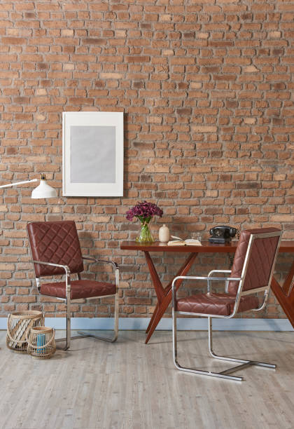 istock modern home interior study room raw brick wall with wooden desk chair 1307874902