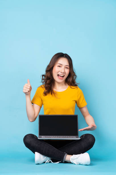 istock The woman uses the laptop 1307874985