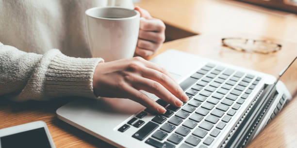 istock Young woman working in home on her laptop computer. 1307875316