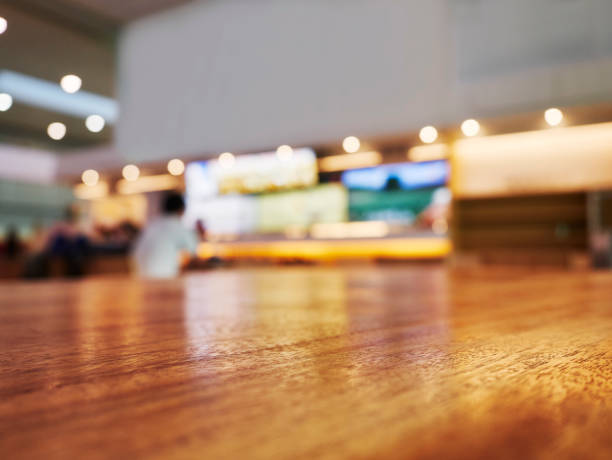 istock Table top counter bar People sitting blur background 1307877085