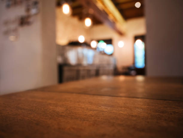istock Table top counter Bar restaurant interior blur background 1307877120