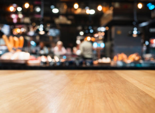 Table top Restaurant Kitchen counter Blur background Table top Restaurant Kitchen counter Chef cooking Blur background wine bar counter stock pictures, royalty-free photos & images