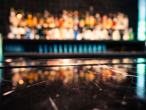 Tabletop counter with Bar shelf Cocktail drink Pub nightlife Blur background