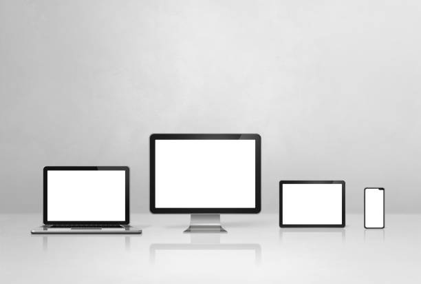 istock computer, laptop, mobile phone and digital tablet pc. white concrete background 1307879544