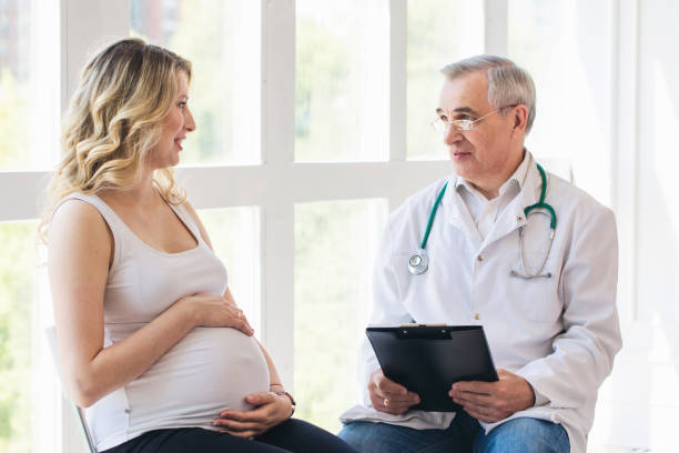 Pregnant woman visiting experienced doctor