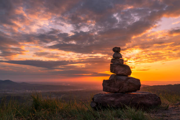 istock Rock Cairn at a colorful Sunset 1307881982