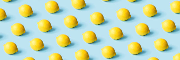 Pattern of ripe lemons on a blue background.