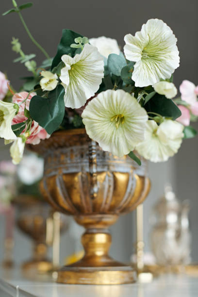 istock Wedding decorations with flowers. Beautiful flower composition in classic interior. Decoration of a banquet at a wedding with flowers. 1307882378