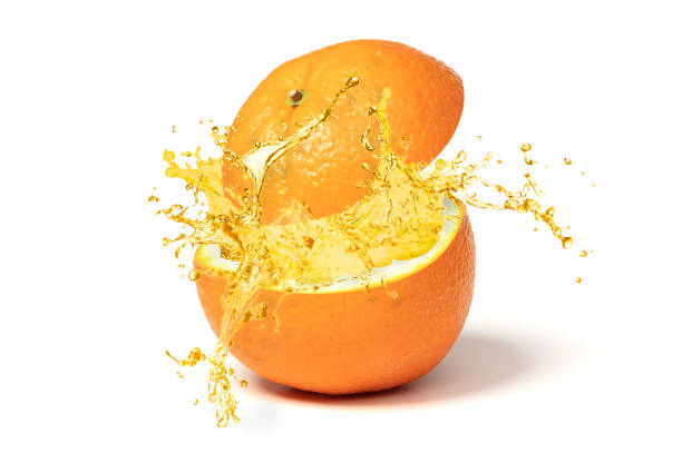 istock Large orange with juicy splash inside, isolated on white 1307883532