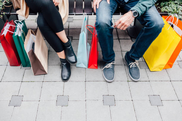 istock Couple With Shopping Bags 1307884741