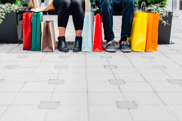 istock Couple With Shopping Bags 1307884836