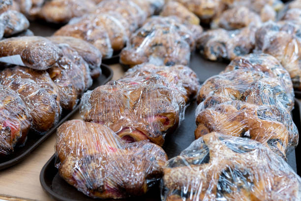 istock buns in plastic wrap, sold in a hypermarket. selective focus 1307885102