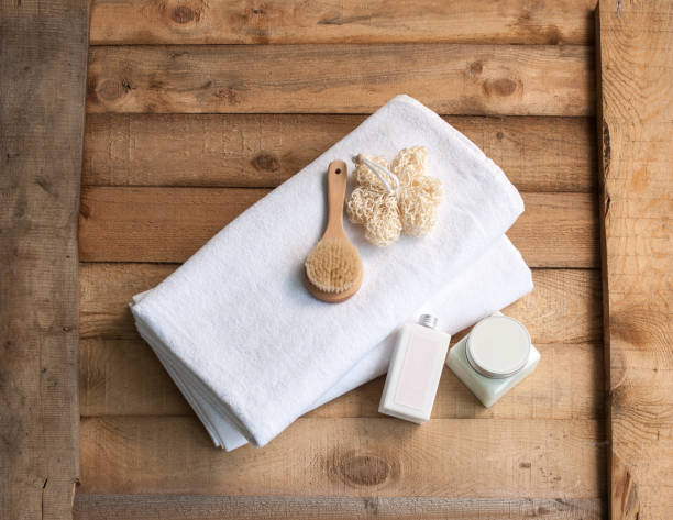 istock modern bathroom product wooden table and white towel 1307885354