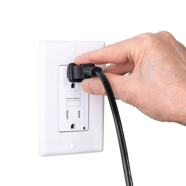 istock Plugging In stock photo 1307891384
