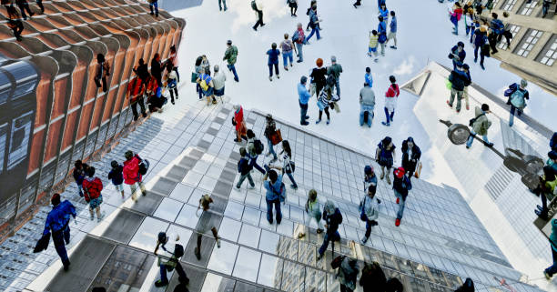 istock Abstract image of people climbing on a skyscraper. 1307893178