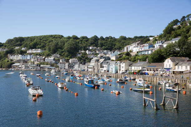 istock Looe Cornwall boats on the river in Cornish fishing town 1307894541