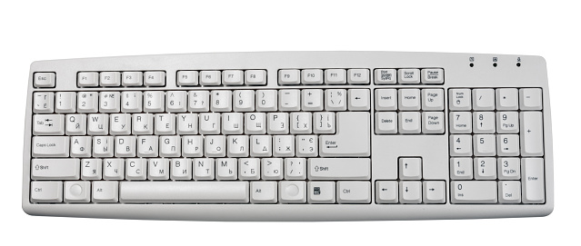 PC Keyboard for Office Home Work with Russian English Cyrillic Letters. Top view Computer Keyboard Qwerty multimedia Wired 104 Keys Full Size white color Backlit with copy space