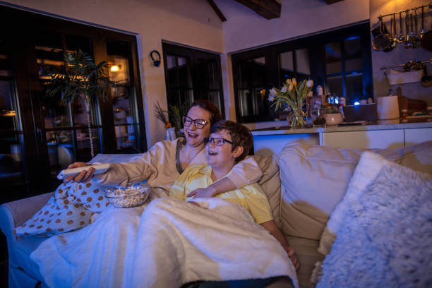 istock Mother and son watching comedy movie 1307895345