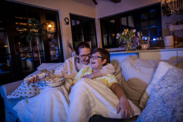 istock Mother and son watching comedy movie 1307896032