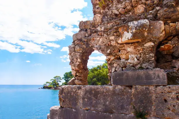 Ruins of the ancient city of Phaselis, Turkey. Roman ancient ruins on sea background. Phaselis Antik Kenti Antalya