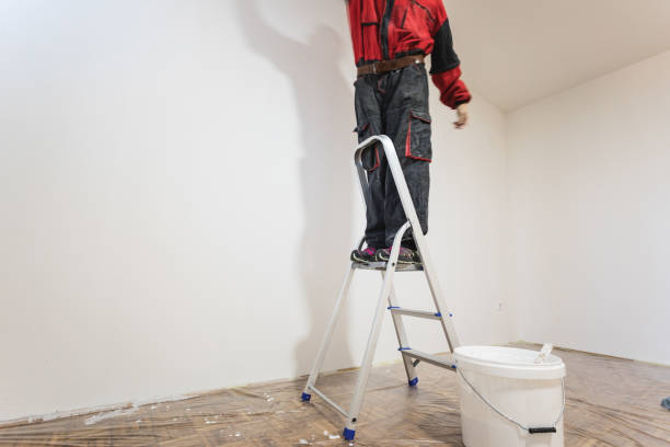 istock Home improvement, man painting walls 1307904386