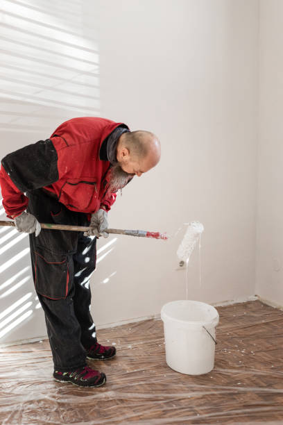 istock Home improvement, man painting walls 1307907326