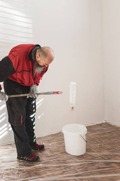 istock Home improvement, man painting walls 1307907330