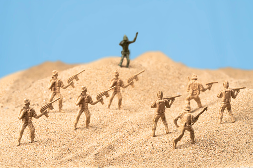 Plastic toy Soldiers in the Desert
