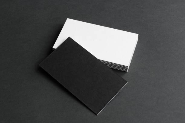istock Business card on gray background. 1307910875