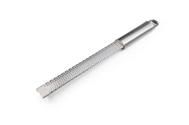 istock Stainless steel fine grater isolated on white background. 1307911282