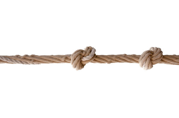 istock Rope with two knots isolated on white background. 1307911341
