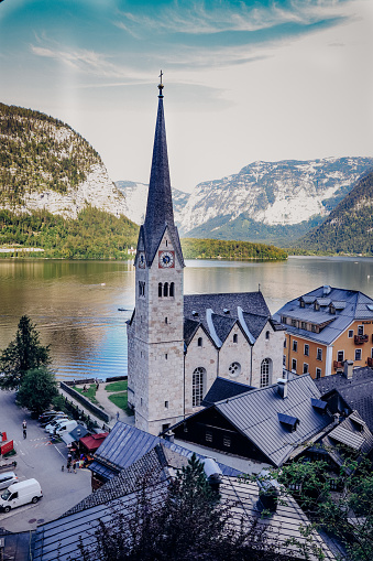 biggest tourist attraction of Austria, the village in the central part of Austria Hallstatt with the beautiful Cemetery Marian Church of the Virgin Mary, which is the pride of this picturesque destination.