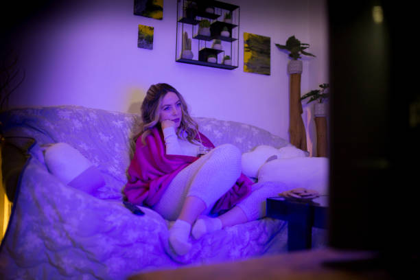 istock Woman watching TV 1307913815