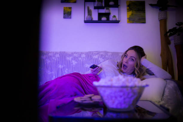 istock Woman watching TV 1307913878