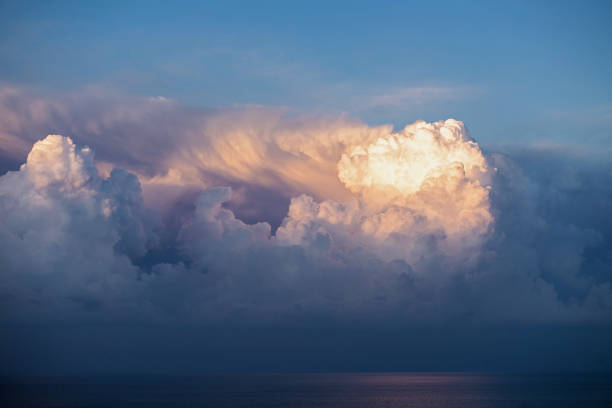 istock Cumulus storm clouds over the sea, weather forecast, atmospheric front 1307915020