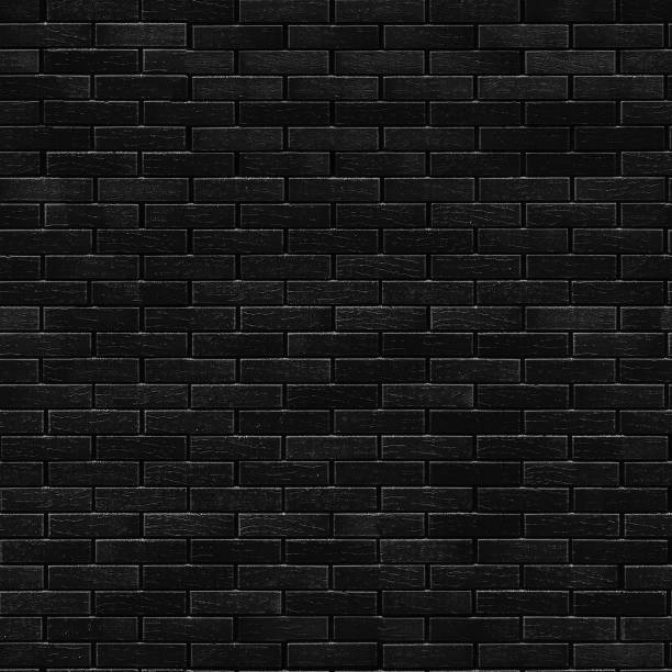 istock Seamless texture Black Brick in winter frost. Tiling clean for background pattern. Rectangle mosaic tiles wall high resolution. Old or artificially aged in production 1307916198