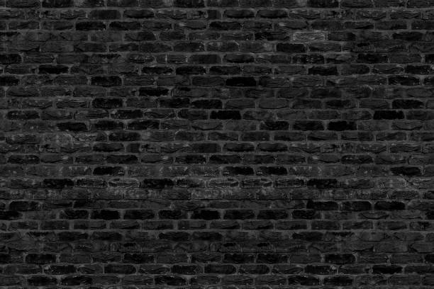istock Seamless texture Black Brick. Tiling clean for background pattern. Rectangle mosaic tiles wall high resolution. Old or artificially aged in production 1307916227