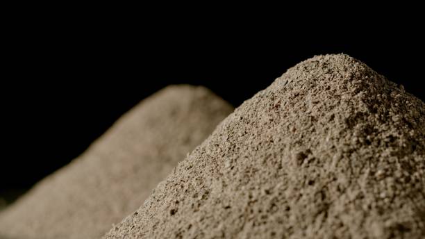 istock Black pepper powder in a pile on a black background 1307919628