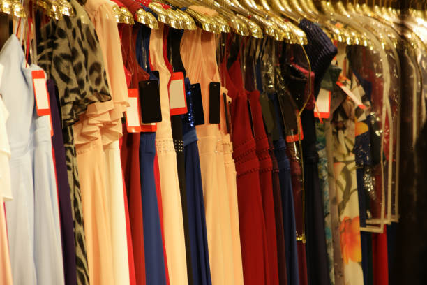 istock Rack of colorful evening dresses close up. 1307920566
